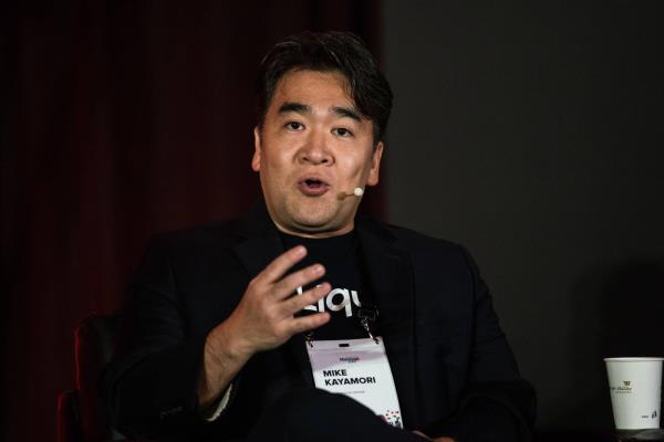 Mike Kayamori, then-chief executive officer of Quoine, speaks during the Money20/20 Asia Co<em></em>nference in Singapore in March 2019. | BLOOMBERG
